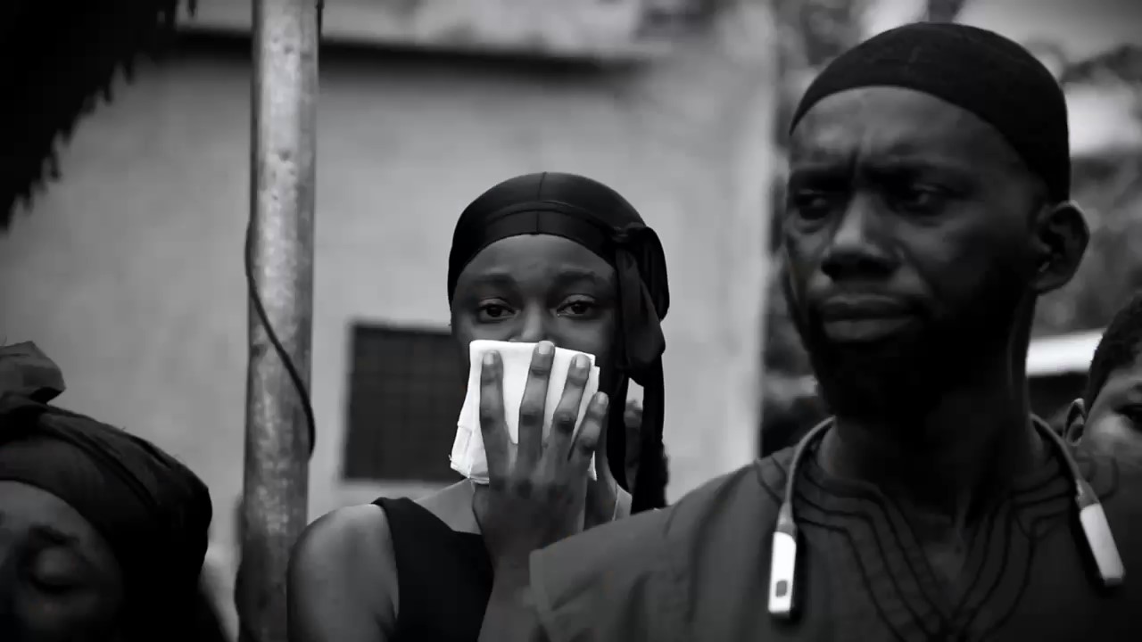 Black-and-white frame from an event film